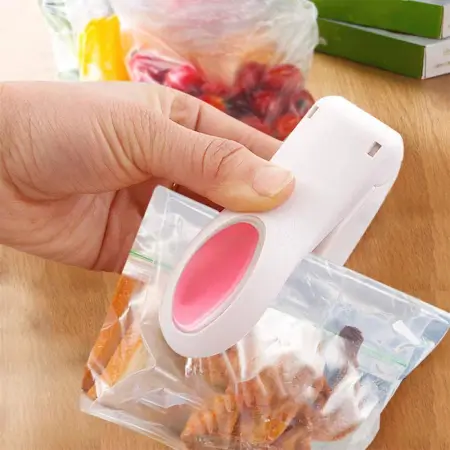 NdBtbd6eCKyNWcP4Cx7wgVm0Vr6iu4Zj42xH7ahZ.webp Handheld Mini Plastic Heat Sealing Machine Airtight Bag Sealer ( multicolor, Standard ).