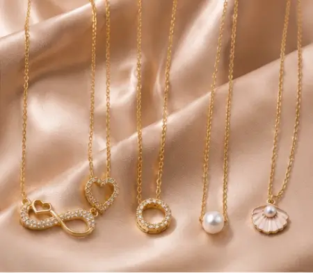 Mhrr2VM9fqYiauNDR5SCTtJbUpsKKWzhbNEyT5xO.webp Elegant Gold-Plated Necklace Set – Combo of 5 CZ Chain Necklaces for Women & Girls ( gold, OS )