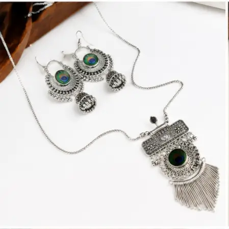 ndWUQT9UVLIMoFuxMXhMsKQsO0t4QyA0BJvw91Hw.webp Tilli Peacock Necklace with Earrings for Women, Oxidised Silver Jewellery Set, Adjustable Necklace Combo, 1 Set ( default, Free Size )